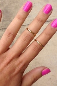 Image of on the tip    above the knuckle/midi ring