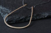 Image of simple horseshoe metal necklace