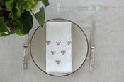 Image of White Napkins with design in Bronze