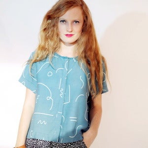 Image of Dusen Dusen hidden placket top