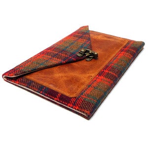 Image of iPad Mini case with a pocket in brown, orange and blue tweed