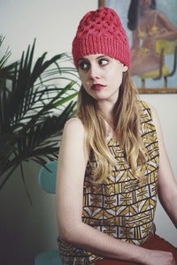 Image of petawawa cable merino toque (shown in coral)