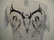 Image of animal skull and leaves print on womens burnout tee