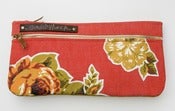 Image of double zip clutch in tomato with vintage floral appliques (b)