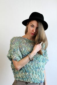Image of welland merino wool sweater (shown in carnival )