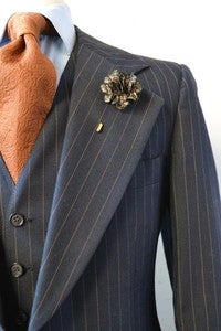 Image of leopard lapel flower