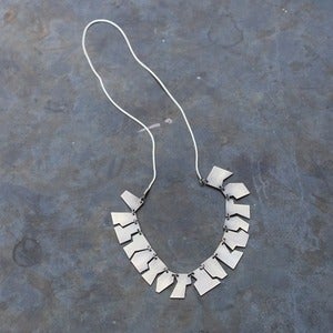 Image of Broken Necklace