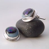 Image of eccentrics glass and sterling cufflinks