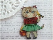 Image of Girl Kitty Cat with Bird Brooch
