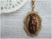 Image of Pussy Cat with Red Ribbon in Wooden Frame Necklace