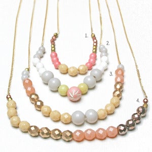 Image of Long gold chain beaded necklace