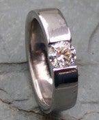 Image of Titanium Shiny Band Tension Set Half Carat Certified Near Colorless Diamond Ring