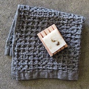 Image of organic lattice-weave face towel