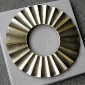 Image of sun brass trivet