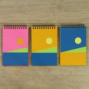 Image of neon landscape notebooks