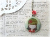 Image of Girl with Beanie Locket Necklace