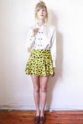 Image of yellow bows skirt