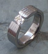 Image of Rippled Titanium Band Round Tension Set 5/8 Carat Certified Near Colorless Diamond Ring