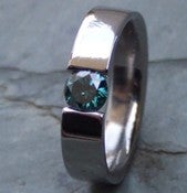 Image of Titanium Super Shiny Band Tension Set 1/2 Carat Certified Blue Diamond Ring