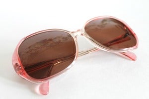 Image of 1970's vintage sunglasses. Never Worn.
