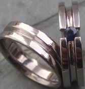 Image of Titanium Striped Tension Set Band Brilliant Cut Blue Sapphire Wedding Ring Set