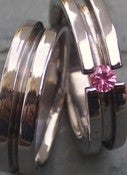 Image of Titanium Striped Tension Set Band - Brilliant Cut Pink Sapphire Wedding Ring Set