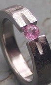 Image of Titanium Ground Notch Band 1/3 Carat Appraised Brilliant Cut Pink Sapphire Ring