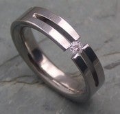 Image of Titanium Forked Tension Set Band Round White Diamond Ring