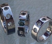 Image of Titanium Tension Set Ring 1/2 Carat Certified Blue Diamond Ring and Wedding Band Set