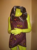 Image of peacock contrast vest