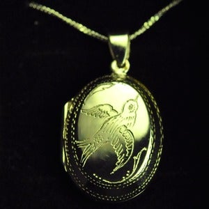 Image of Hand Engraved Silver Flying Bird Locket