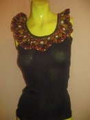 Image of black dishiki ruffle tank