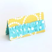 Image of checkbook cover - yellow rings 