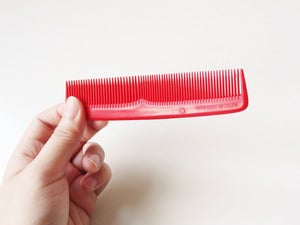Image of Red plastic comb