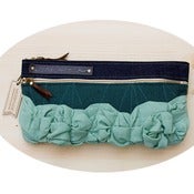 Image of tough ruffles double zip clutch in sea glass