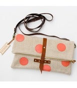 Image of foldover crossbody bag with hand cut leather dots (coral)