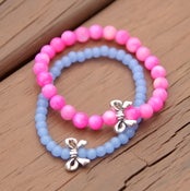 Image of mrd arm candy- blue/pink silver bow bracelet