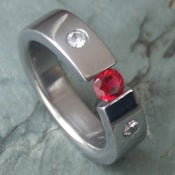 Image of Titanium Tension Ruby Ring With 2 Accent Diamonds