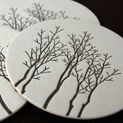 Image of gray trees, letterpress coasters