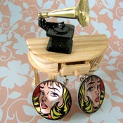 Image of graphic novel heroine earrings