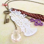 Image of fantasy for trumpeter necklace