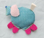 Image of dog brooch, pink feet