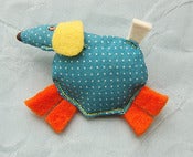 Image of dog brooch, orange feet