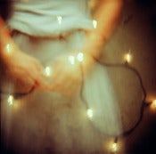 Image of hands + lights