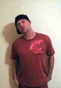 Image of Hand painted faded red t's by designer Nicholas Conlon