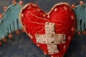 Image of Blue Winged Heart with white cross brooch