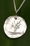 Image of Silver Medallion Necklace Tree, Growth