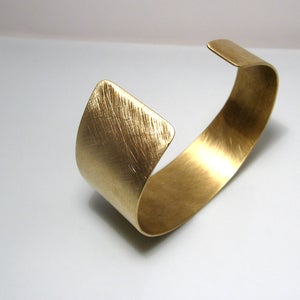 Image of asymmetrical cuff. bracelet. brass.