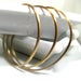 Image of modern stackable cuffs. bracelets. brass.