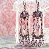 Image of plum pink dramatic chandelier earrings
